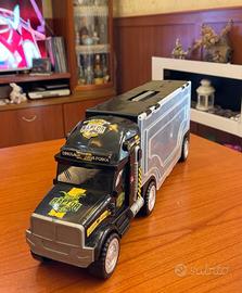 camion giocattolo Raptor dinosauro trasporto