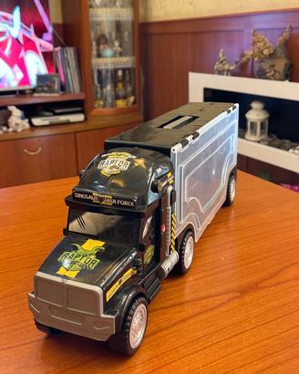 camion giocattolo Raptor dinosauro trasporto