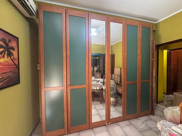 Parete attrezzata e armadio