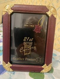 Cornice in vera pelle nuova con inserti dorati