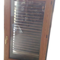 Finestra e persiana in pvc color legno casa