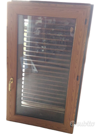 Finestra e persiana in pvc color legno casa