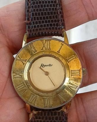 orologio vintage di marca reporter con cinturino