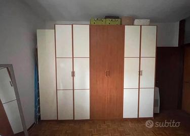 Armadio camera da letto.  6 ante + 1 scarpiera.