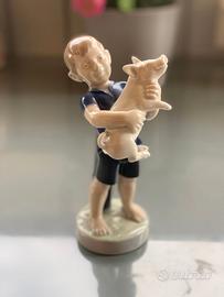 ROYAL COPENAHGEN – August Boy with Pig #4530