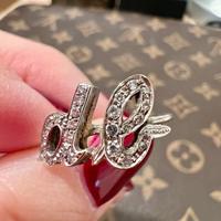 Anello vintage in oro bianco e brillantini