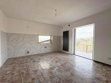 Appartamento con garage e giardino privato