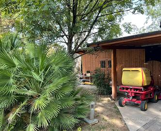 Tettoia in Legno  con Casetta Deposito da Giardino