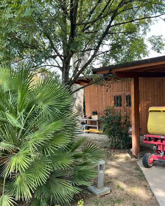 Tettoia in Legno  con Casetta Deposito da Giardino