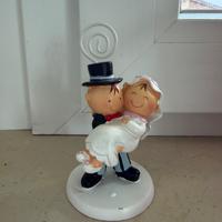 Coppia sposi statuina matrimonio porta foto