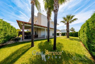 Villa con giardino