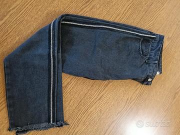 Jeans Candida neri con strisce di strass laterali
