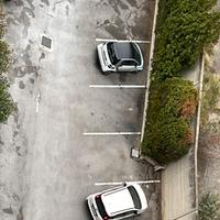 Posto auto non coperto protetto da cancello