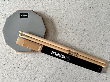 Pad con baccgette per batteria