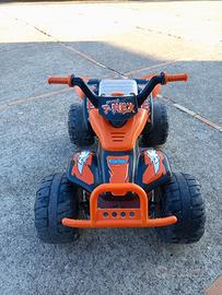Peg Perego Corral T-Rex Quad elettrico arancione.