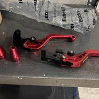 Leve originali Benelli rosse e bilancieri