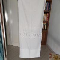 tenda da interni con fettuccia e gancetti a  binar