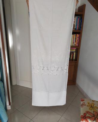 tenda da interni con fettuccia e gancetti a  binar