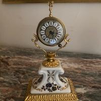 Orologio blessing con rifiniture in oro