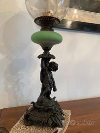 Lampada ad olio antica in bronzo