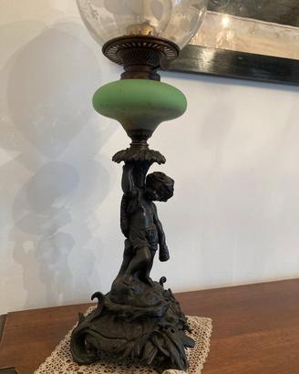 Lampada ad olio antica in bronzo