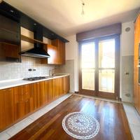 Cucina in legno anta liscia