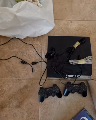 PS3 SLIM + TELECAMERA E 4 GIOCHI (LEGGI NOTA)