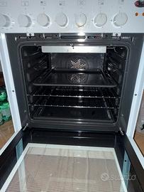 Cucina  4 fuochi firno elettrico ventilato
