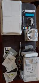 Wii + wii fit plus + mariokart wii 