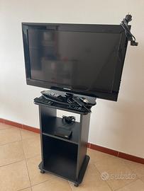 TV SAMSUNG, mobiletto e fire stick.