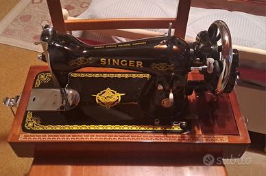 Macchina da cucire d'epoca Singer con custodia 