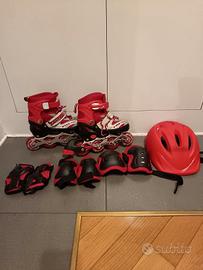 Patini completi con le protezioni e casco