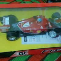 ferrari in scala più trattore telecomandato