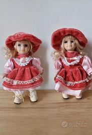 Set 2 bambole vintage con vestito in velluto rosa