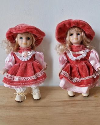 Set 2 bambole vintage con vestito in velluto rosa