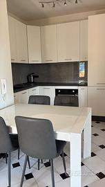 Bivano con terrazza e posto auto