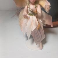 Bambola in fine porcellana 