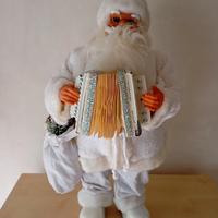 Babbo Natale con fisarmonica e sacca porta doni 