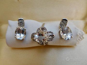 Anello + orecchini,topazi bianchi+ petaliti.Parure