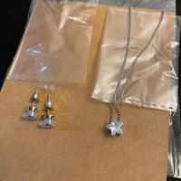 Collana e orecchini stella