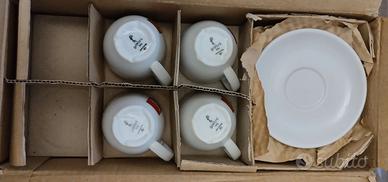 Set. 4 tazzine caffè Illy e 4 piattini 1980s
