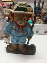 Fermaporta in ghisa a forma di orsetto pescatore