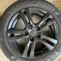 4 cerchi in lega neri + 4 pneumatici invernali