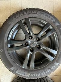 4 cerchi in lega neri + 4 pneumatici invernali
