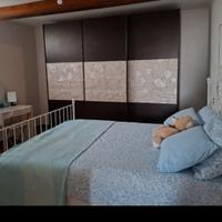 Armadio e letto in ferro battuto 