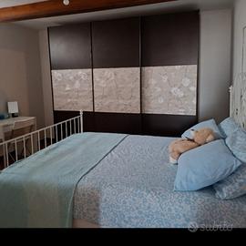 Armadio e letto in ferro battuto 