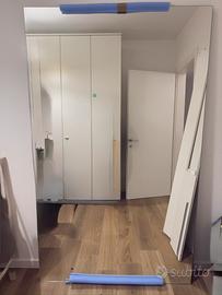 Specchio negozio e casa