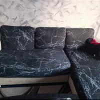 Divano con penisola contenitore e letto