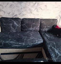 Divano con penisola contenitore e letto