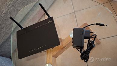 Router WiFi "Asus"!Modello "DSL N12e-C1"